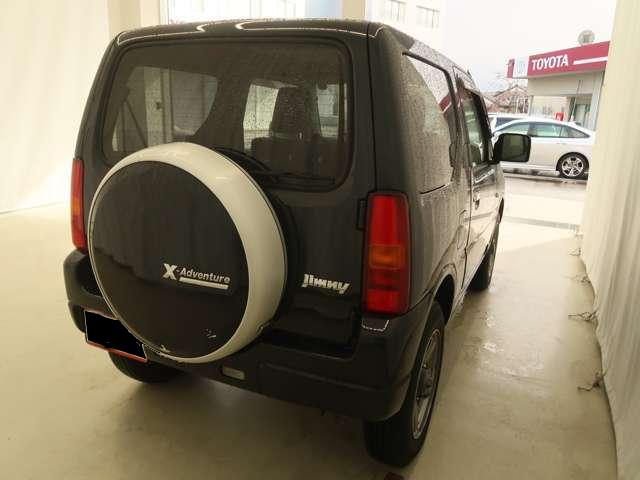 Used Suzuki Jimny, Cross Venture, Automatic Transmission, 2013 Model, Black color photo: Back view