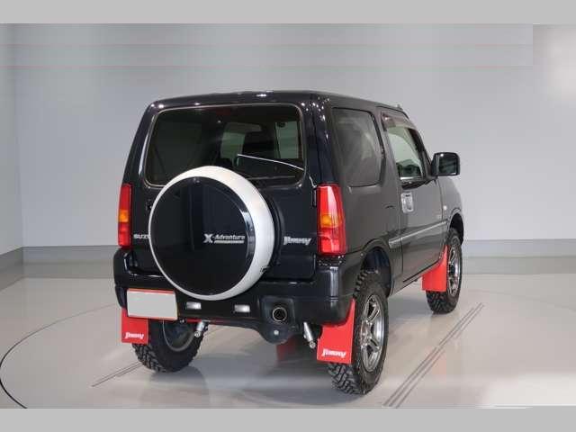 Used Suzuki Jimny, Cross Venture, Manual Transmission, 2014 Model, Black color photo: Back view