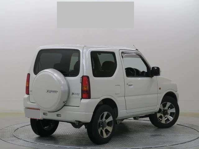 Used Suzuki Jimny, XG, Automatic Transmission, 2012 Model, White Pearl color photo: Back view