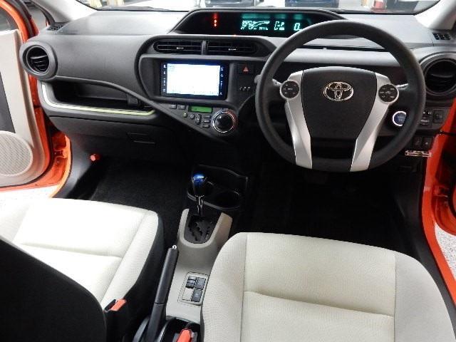 Toyota Aqua used car 2012 model Orange color photo: Cockpit view (Driver view)