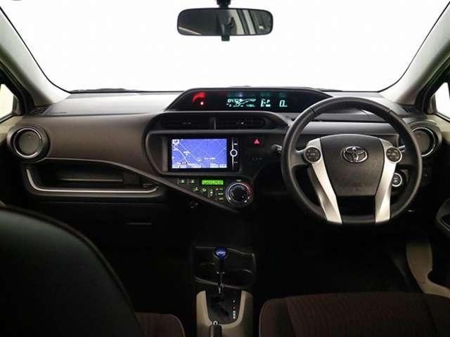 Toyota Aqua used car 2013 model Pearl White color photo: Cockpit view (Driver view)