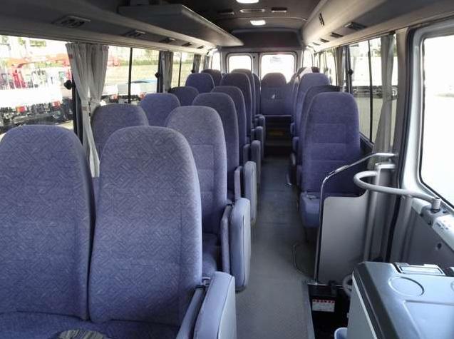 Used Toyota Coaster Bus photo: 2014 model White and Lavender Two Tone color - Interior view
