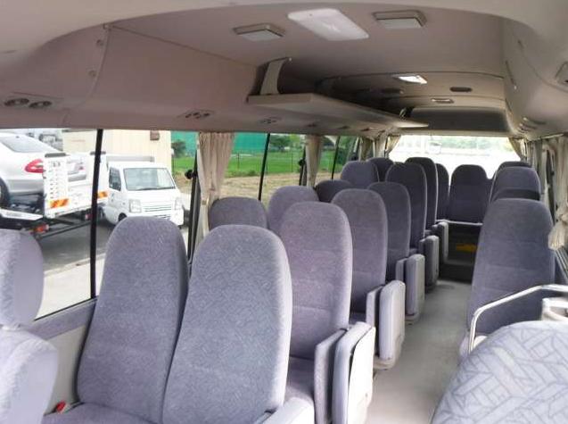 Used Toyota Coaster Bus photo: 2015 model Gold color - Interior view