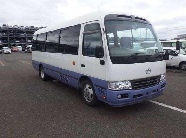 Used Toyota Coaster Bus photo: 2016 model White and Lavender Two Tone color - Front view