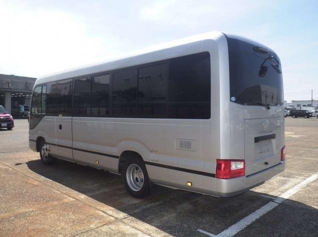 Used Toyota Coaster Bus photo: 2017 model Silver color - Back view