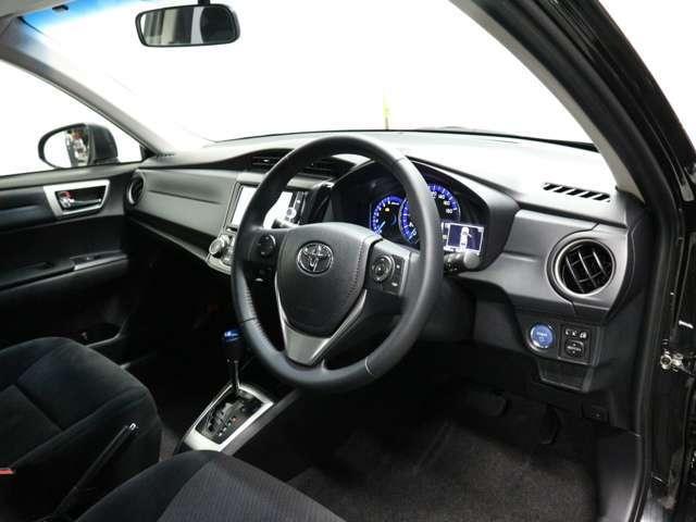 Toyota Corolla Axio Hybrid used car 2013 model Black color photo: Interior view