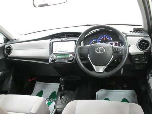 Toyota Corolla Axio Hybrid used car 2013 model White Pearl color photo: Interior view