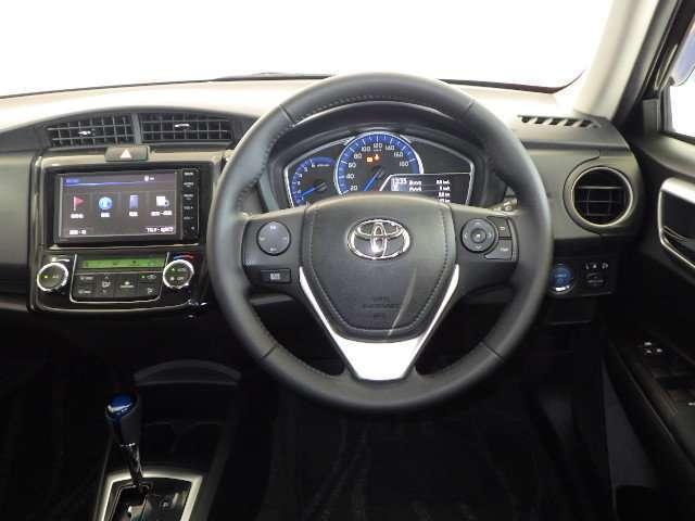 Toyota Corolla Axio Hybrid used car 2014 model Black color photo: Interior view