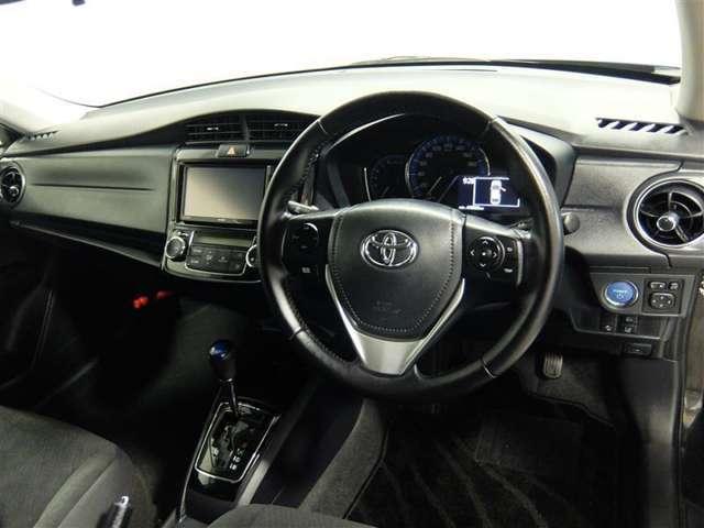 Toyota Corolla Axio Hybrid used car 2016 model Black color photo: Interior view