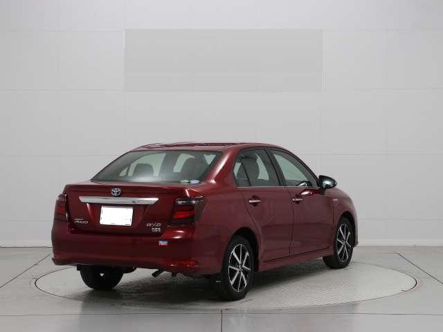 Used Toyota Corolla Axio Hybrid 2017 model, Red color photo: Back view