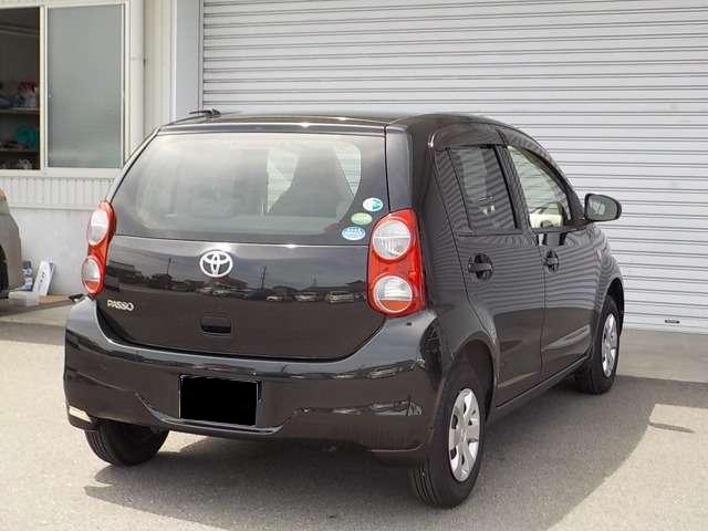 Used Toyota Passo 2012 model Black body color photo: Back view