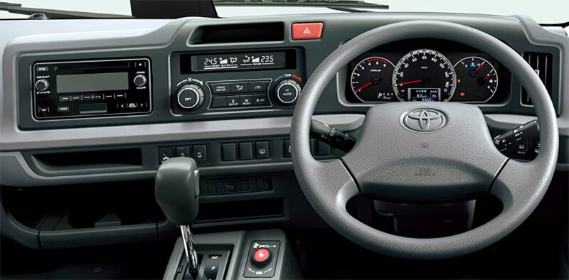 New Toyota Coaster Bus EX Model photo: Cockpit view image (Driver Seat picture)